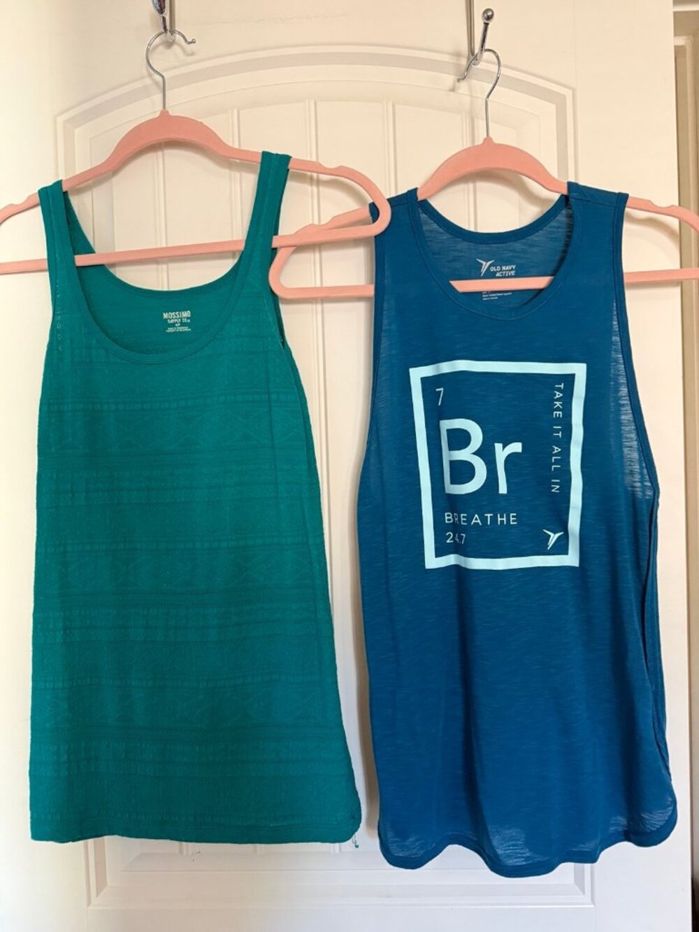 2 women’s blue/teal tank tops